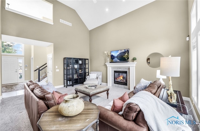 4360 Turtle Creek Dr, Perrysburg, OH 43551 - living area featuring high vaulted ceiling, light colored carpet, stairs, and baseboards