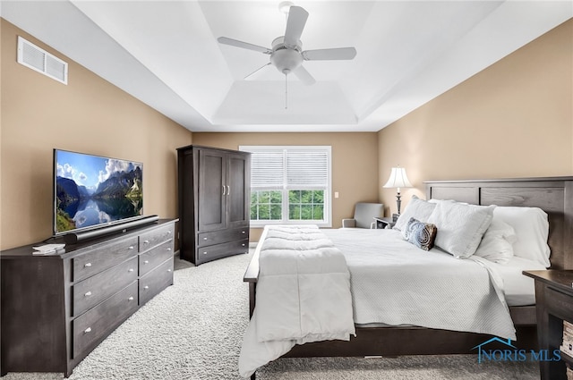 4360 Turtle Creek Dr, Perrysburg, OH 43551 - bedroom with a raised ceiling, light colored carpet, and a ceiling fan