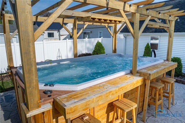 313 E Lynn St, Edgerton, OH 43517 - view of pool featuring a hot tub and a pergola