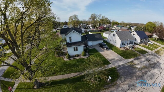 313 E Lynn St, Edgerton, OH 43517 - aerial perspective of suburban area