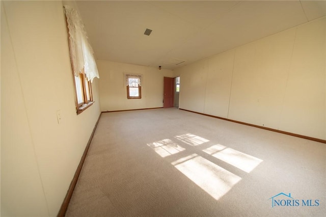 313 E Lynn St, Edgerton, OH 43517 - unfurnished room featuring light carpet and baseboards