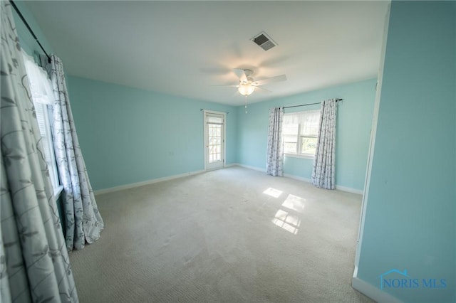 313 E Lynn St, Edgerton, OH 43517 - carpeted empty room with ceiling fan and baseboards