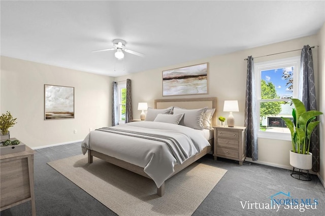1141 Oriole Dr, Bowling Green, OH 43402 - carpeted bedroom featuring baseboards and ceiling fan
