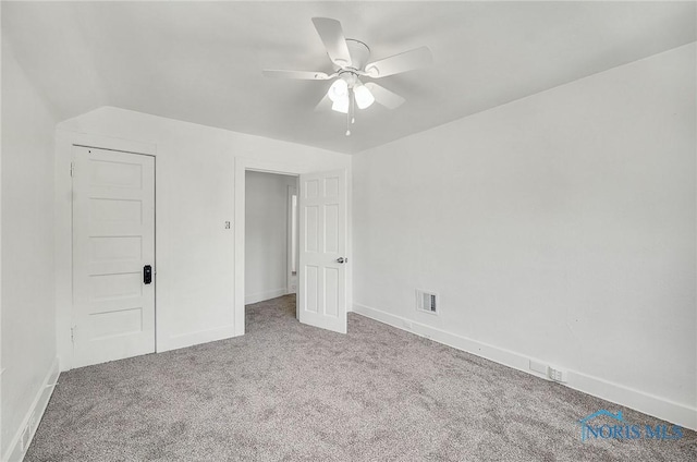 345 W Manhattan Blvd, Toledo, OH 43608 - unfurnished bedroom featuring carpet, baseboards, and ceiling fan