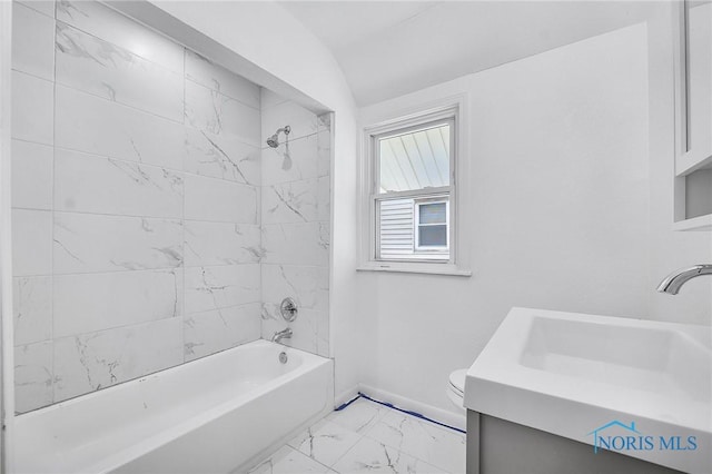 345 W Manhattan Blvd, Toledo, OH 43608 - full bath featuring marble look tile flooring, vanity, toilet, shower / tub combination, and baseboards