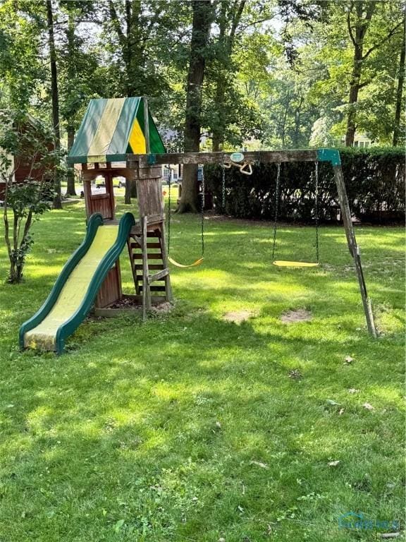 309 Koerber Dr, Defiance, OH 43512 - view of jungle gym featuring a lawn