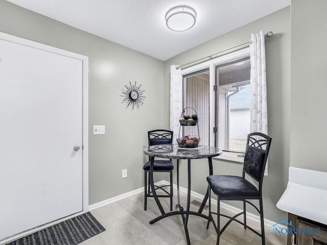 1104 Bernath Pkwy, Toledo, OH 43615 - dining area with baseboards