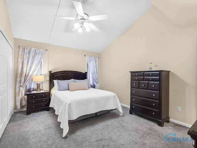 1104 Bernath Pkwy, Toledo, OH 43615 - carpeted bedroom with lofted ceiling, a closet, ceiling fan, and baseboards
