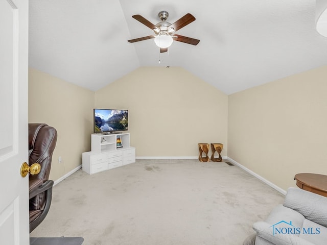 1104 Bernath Pkwy, Toledo, OH 43615 - unfurnished living room featuring lofted ceiling, a ceiling fan, carpet, and baseboards