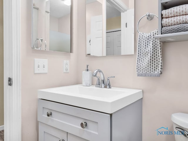 1104 Bernath Pkwy, Toledo, OH 43615 - bathroom featuring vanity and toilet