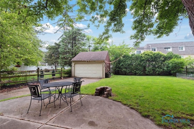 3127 Drummond Rd, Toledo, OH 43606 - view of patio / terrace featuring an outdoor structure, a detached garage, and outdoor dining area