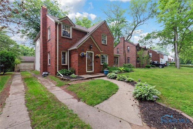 3127 Drummond Rd, Toledo, OH 43606 - view of front of property featuring brick siding and a chimney
