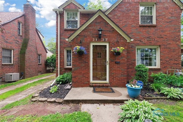 3127 Drummond Rd, Toledo, OH 43606 - tudor house featuring brick siding and central AC unit
