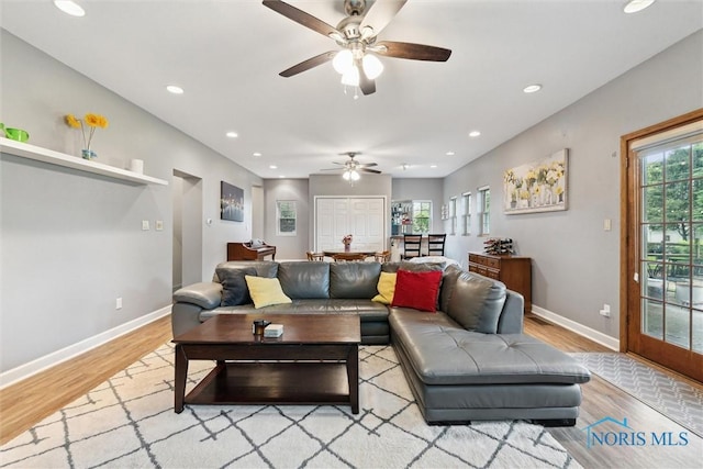 3127 Drummond Rd, Toledo, OH 43606 - living area featuring light wood-type flooring, baseboards, a ceiling fan, and recessed lighting