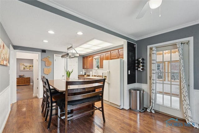 3127 Drummond Rd, Toledo, OH 43606 - dining area with wood finished floors, ornamental molding, recessed lighting, and a ceiling fan