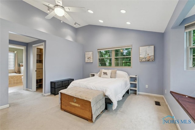 3127 Drummond Rd, Toledo, OH 43606 - bedroom featuring vaulted ceiling, multiple windows, light colored carpet, recessed lighting, and baseboards