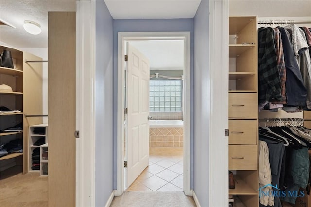 3127 Drummond Rd, Toledo, OH 43606 - walk in closet with light tile patterned flooring