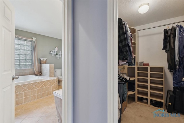 3127 Drummond Rd, Toledo, OH 43606 - walk in closet featuring tile patterned floors