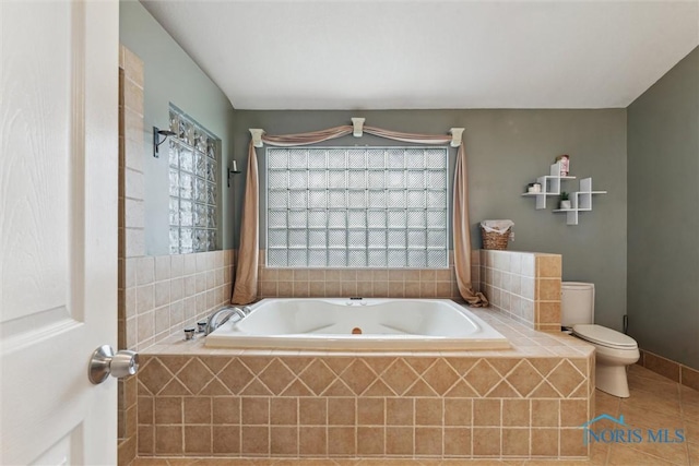 3127 Drummond Rd, Toledo, OH 43606 - full bathroom with a bath, toilet, and tile patterned floors