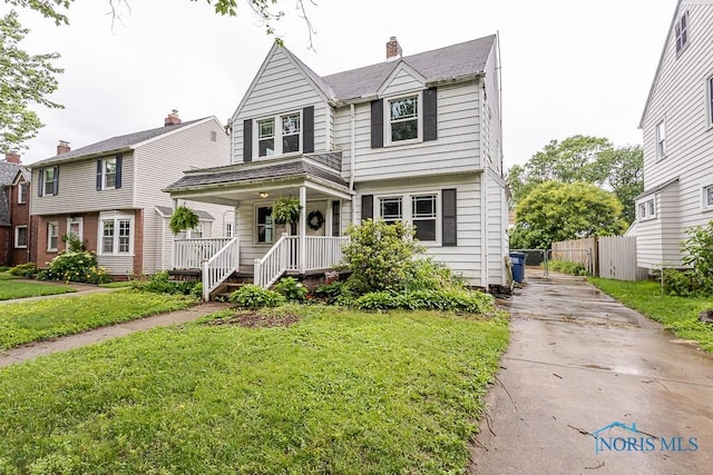 3819 Rushland Ave, Toledo, OH 43613 - view of front facade with a porch and driveway