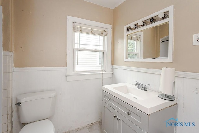 3819 Rushland Ave, Toledo, OH 43613 - bathroom with a wainscoted wall and vanity