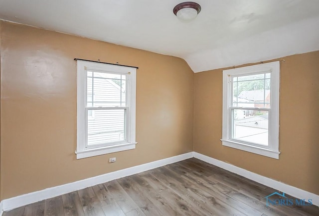 3819 Rushland Ave, Toledo, OH 43613 - empty room with vaulted ceiling and wood finished floors
