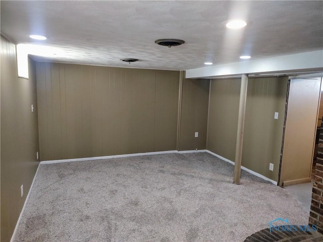 2417 Lambert Dr, Toledo, OH 43613 - finished below grade area featuring carpet floors and baseboards