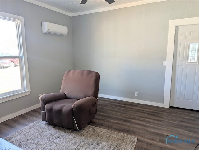 726 S Lynn St, Bryan, OH 43506 - sitting room featuring an AC wall unit, healthy amount of natural light, baseboards, wood finished floors, and ornamental molding