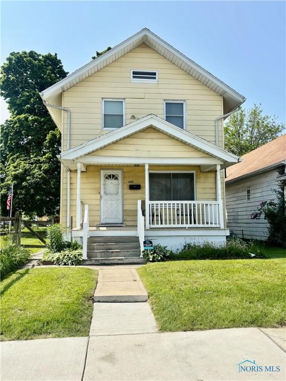 1522 Nevada St, Toledo, OH 43605 - view of front facade featuring a porch