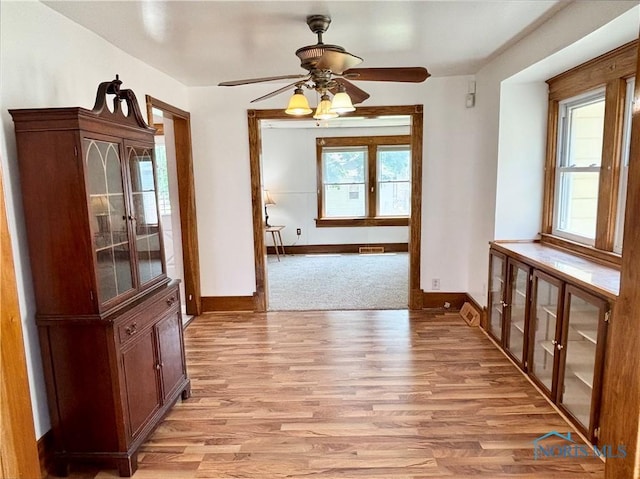 1522 Nevada St, Toledo, OH 43605 - corridor featuring light wood-style floors, healthy amount of natural light, and baseboards