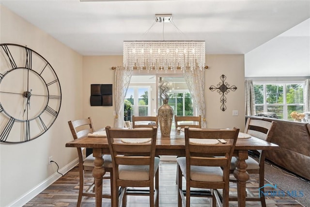 10 Hidden Village Ln, Holland, OH 43528 - dining room with dark wood-type flooring and a chandelier