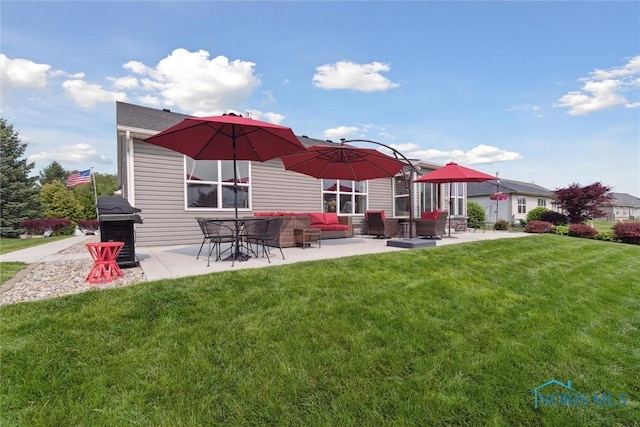 10 Hidden Village Ln, Holland, OH 43528 - rear view of house featuring a patio area and a lawn