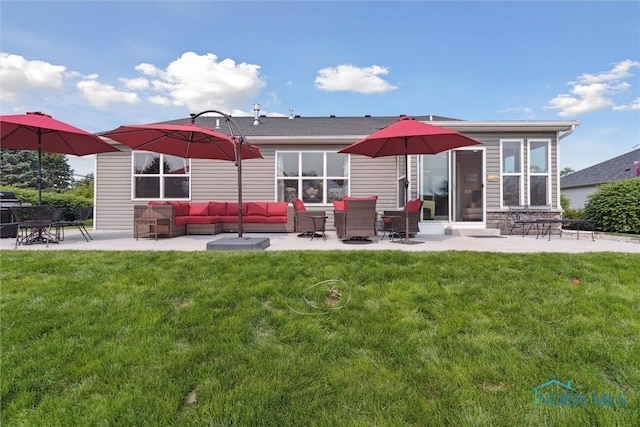 10 Hidden Village Ln, Holland, OH 43528 - rear view of house with an outdoor living space, a patio area, and a lawn