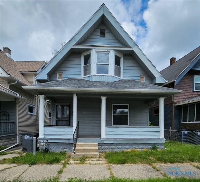 630 Highland Ave, Toledo, OH 43610 - bungalow featuring a porch