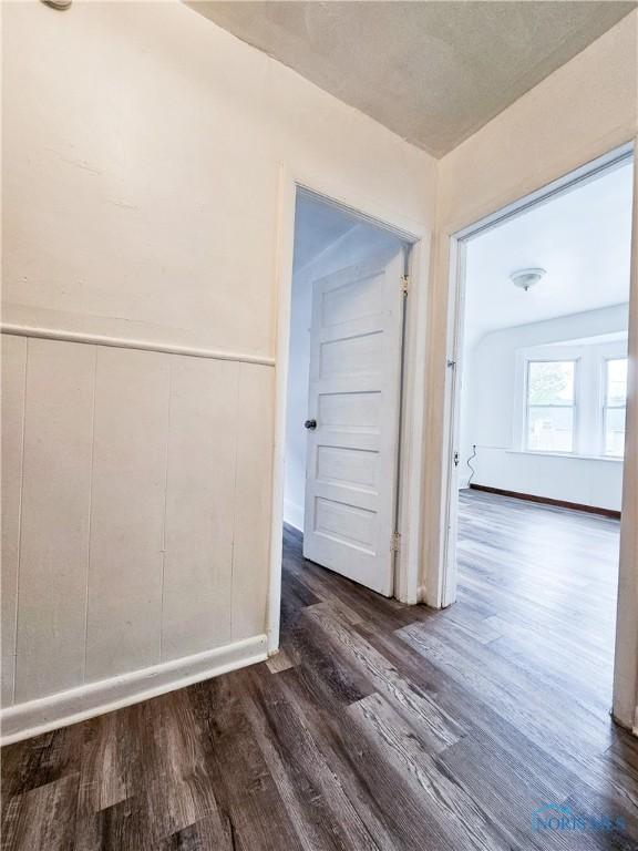 630 Highland Ave, Toledo, OH 43610 - hallway with dark wood-style floors