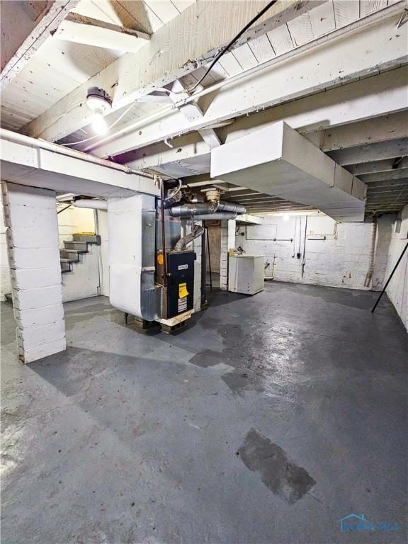 630 Highland Ave, Toledo, OH 43610 - unfinished below grade area with stairs and heating unit
