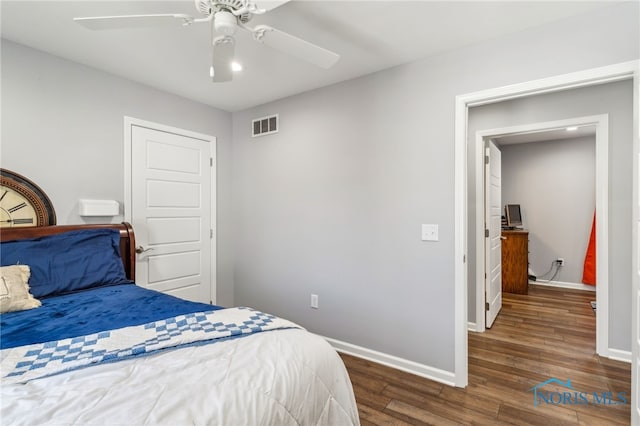 1313 Washington Ave, Findlay, OH 45840 - bedroom with wood finished floors, baseboards, and ceiling fan