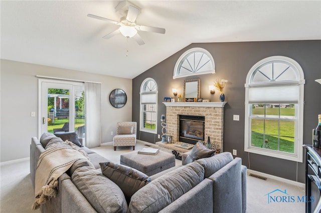 3112 Jacob Dr, Findlay, OH 45840 - living area with light carpet, baseboards, lofted ceiling, and ceiling fan