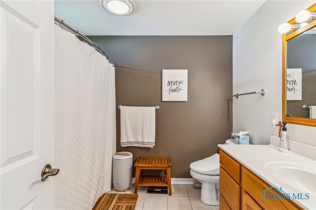 3112 Jacob Dr, Findlay, OH 45840 - full bath featuring tile patterned flooring, toilet, vanity, baseboards, and curtained shower