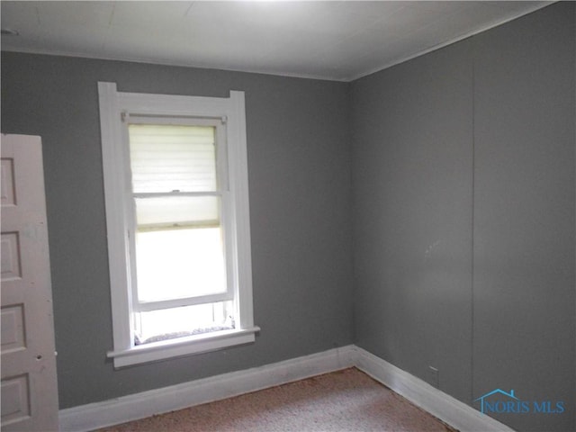 2815 Mulberry St, Toledo, OH 43608 - spare room with light colored carpet and baseboards