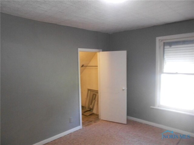 2815 Mulberry St, Toledo, OH 43608 - unfurnished bedroom with carpet and baseboards