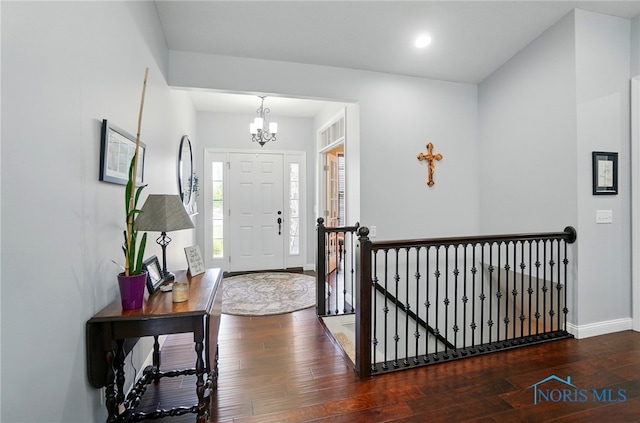 16187 Sugar Maple Ct, Findlay, OH 45840 - entryway featuring a chandelier, hardwood / wood-style floors, and baseboards
