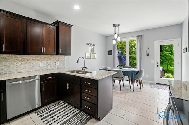 16187 Sugar Maple Ct, Findlay, OH 45840 - kitchen featuring stainless steel dishwasher, a sink, light tile patterned flooring, tasteful backsplash, and dark brown cabinetry