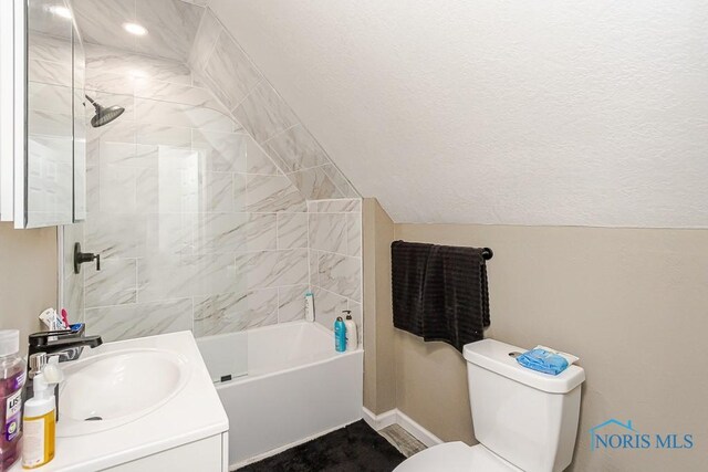 1129 Mason St, Toledo, OH 43605 - full bath with toilet, baseboards, vanity, and tub / shower combination