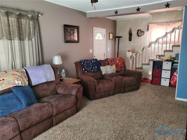 406 S State St, Pioneer, OH 43554 - carpeted living area with crown molding and stairway