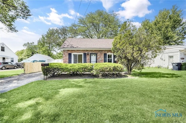 2101 Trailview Dr, Maumee, OH 43537 - view of front facade featuring brick siding