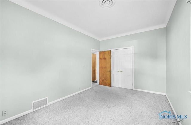2101 Trailview Dr, Maumee, OH 43537 - unfurnished bedroom featuring carpet flooring, baseboards, and a closet