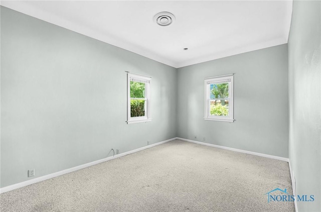 2101 Trailview Dr, Maumee, OH 43537 - unfurnished room with baseboards and carpet