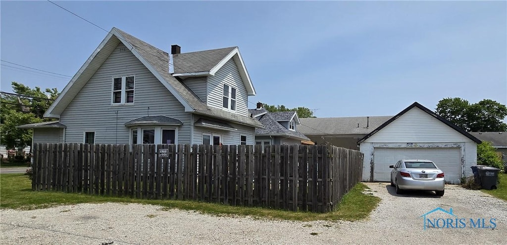 3146 131st St, Toledo, OH 43611 - view of front facade featuring a garage