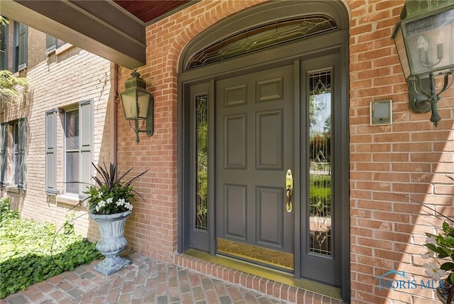 25840 W River Rd, Perrysburg, OH 43551 - property entrance featuring brick siding